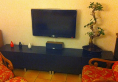 Installation d'un TV au mur et intégration des appareils Audio/Vidéo